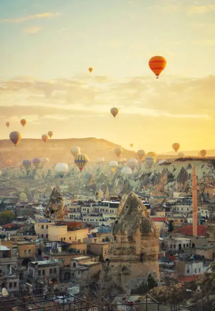 Hot air balloons flying over city Ürgüp Cappadocia, Turkey