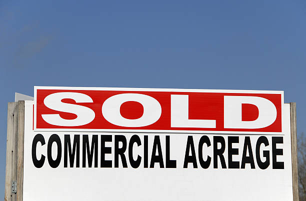 Real estate agent showing sold sign isolated on white background. Beautiful smiling Asian / Caucasian female Real Estate Agent standing confident in full length.Click for more: