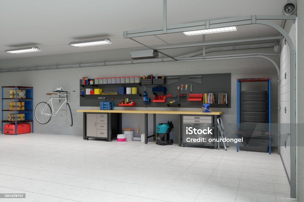 Empty Garage With Working Equipments, Tools And Bicycle Hanging On The Wall. Auto Repair Shop Stock Photo