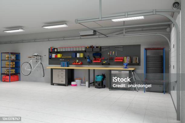 Empty Garage With Working Equipments Tools And Bicycle Hanging On The Wall Stock Photo - Download Image Now
