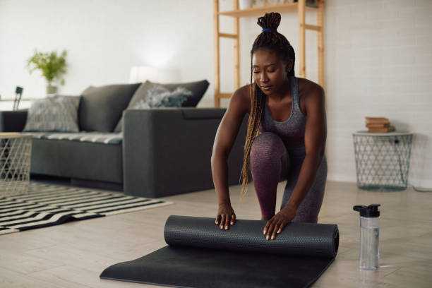 istock Young black female athlete preparing for exercising at home. 1341378775