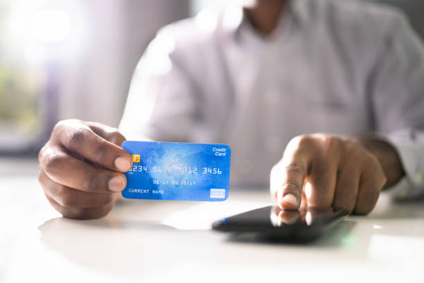 istock Person With Credit Card 1341380718