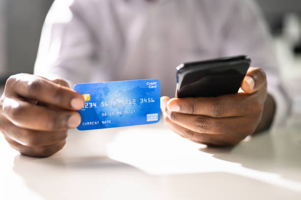 istock Person With Credit Card 1341380733