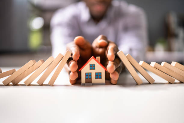 Real Estate House Insurance. Domino Chain Challenge Real Estate House Insurance. Domino Chain Challenge And Risk Protection man hand down stock pictures, royalty-free photos & images