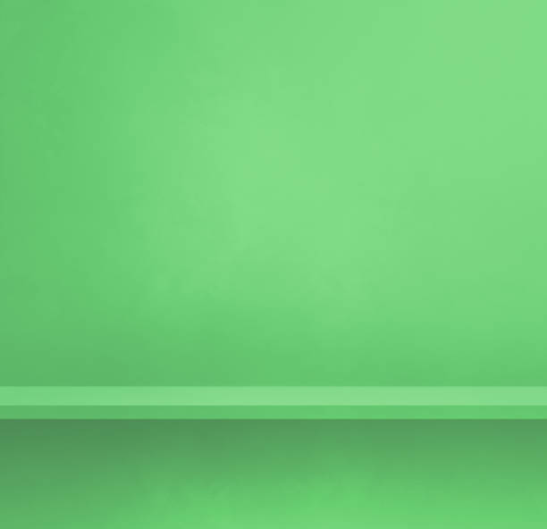 istock Empty shelf on a green wall. Background template. Square banner 1341380890