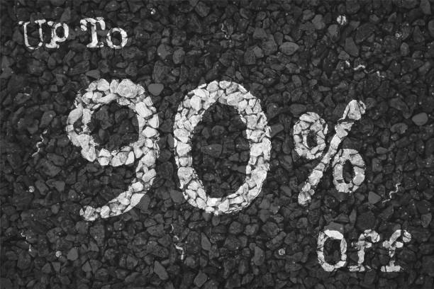 istock Black and white coloured pebbles making a rustic poster with text Up to 90 % Off painted on gravel road with small swirls pattern, for  clearance  up to ninety percent SALE related vector backgrounds 1341380916