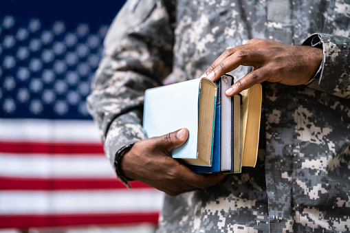 Young Student Soldier In Uniform. Veteran Study