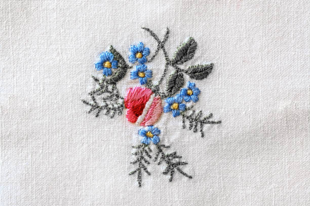 istock flower embroidery on old tablecloth 1341387871