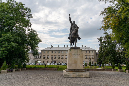 Zamosc, Poland - 13 September, 2021: statue of Jan Zamoyski in the historic Old Town city center of Zamosc