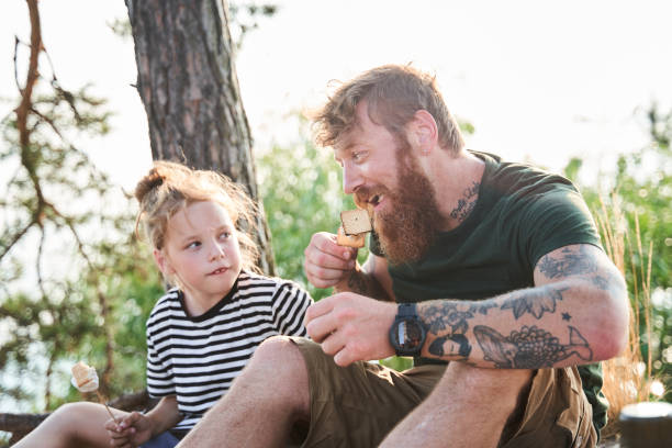 istock Father and daughter talking with each other and remembering funny moments 1341394376