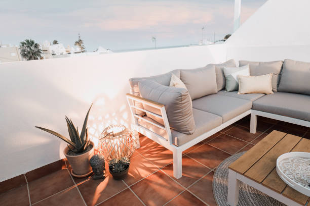 istock Terrace with couch and and lantern at dusk 1341394813