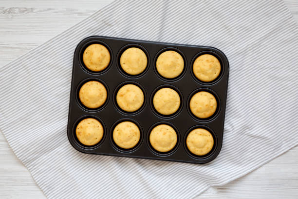 istock Homemade Cornbread Muffins, overhead view. Flat lay, top view, from above. 1341397582