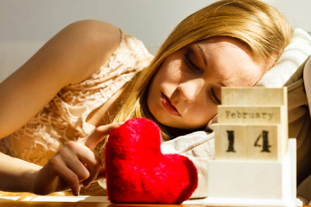 istock Sad woman on Valentines day 1341400428