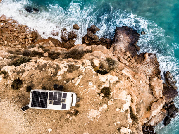 Camper on coast in Spain. Aerial view stock photo