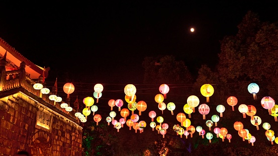 China,Guilin,Rong lake,Mid-Autumn Festival lantern Show exhibition,\nIn Sep 2021.\nDuring the Festival of Lights,The whole park is brightening up \nIn the evening.\nCountless visitors come here,Enjoy the beauty of the visual feast.