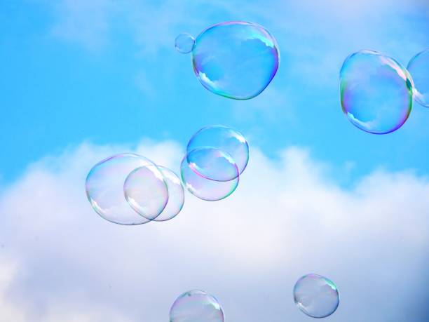 istock Low Angle View Of Bubbles Against Sky 1341403649