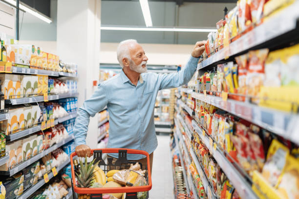 istock Retired man buying groceries 1341406146