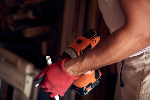 istock Man assembling furniture and fixing it - hobby concept. 1341409821