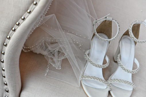 Bride's wedding veil and shoes.