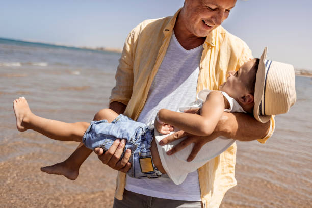 istock On Daddy's arm where he belongs 1341411667