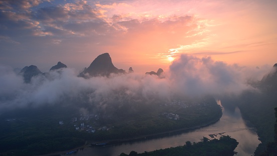 Asia,China,Guilin,Yangshuo,Xingping,Xianggong hill.
Yangshuo is a world famous tourist resort.
Yangshuo is a county of guilin prefecture.
Guilin karst has been included in the world heritage list.
Here the Li River snakes through a fairy-tale landscape of conical limestone peaks,its smooth waters exquisitely mirroring the magical.
Stand at the top of the hill to see the Lijiang River,
Lijiang River and its tributaries,the shuttle in the 
ShiShanfeng forest,mountains and water and hold,very beautiful.
Beautiful Lijiang River,is the world's largest and most beautiful karst landscape scenic resort.
It's the most beautiful landscape waterway has about 15 km.
Large numbers of tourists visit the Li river by yachts every year.