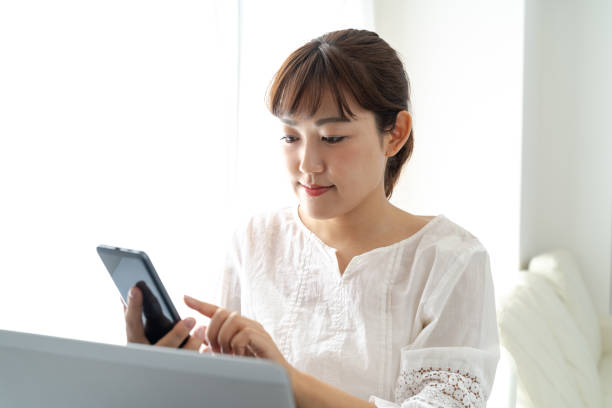 istock Young woman working from home 1341413791