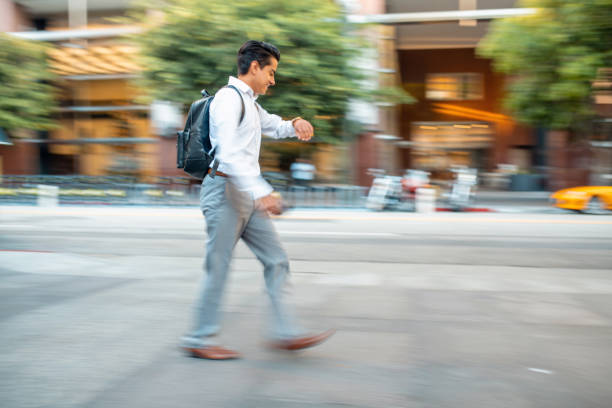 istock Young Adult Hispanic Businessman Late for Work 1341414672