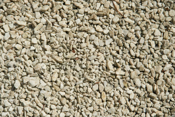 istock Natural colorful pebble stones background texture with copy space. 1341415357