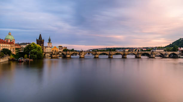 istock Famous Charles bridge in Prague during twilight. 1341416317
