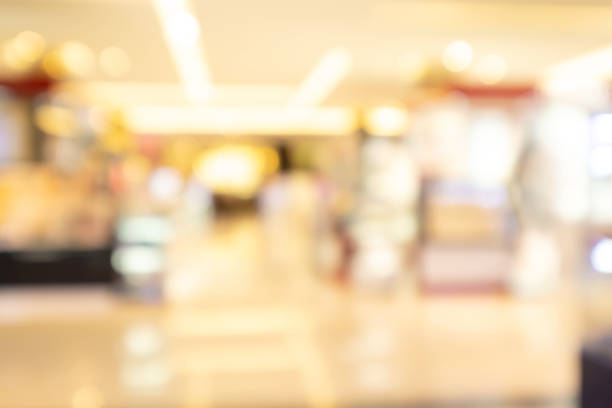 istock Shopping mall abstract defocused blurred background. Business concept. 1341417089