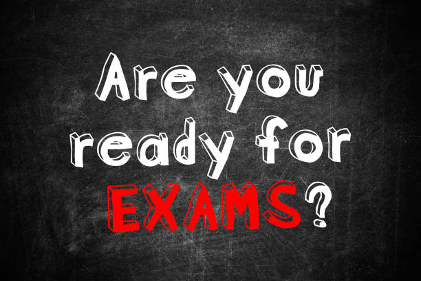 istock Black chalkboard with phrase ARE YOU READY FOR EXAMS as background 1341417132