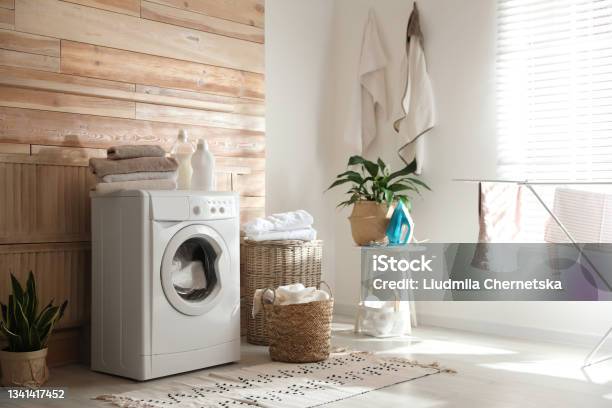Stylish Room Interior With Modern Washing Machine Stock Photo - Download Image Now - Washing Machine, Laundry, Dryer