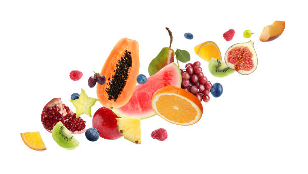 set di diversi frutti freschi tagliati e bacche su sfondo bianco - pomegranate fruit tropical fruit freshness foto e immagini stock