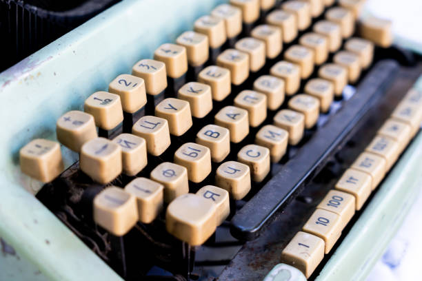 antique typewriter cyrillic keys close up and russian keys selective focus - typewriter typewriter key old typewriter keyboard imagens e fotografias de stock