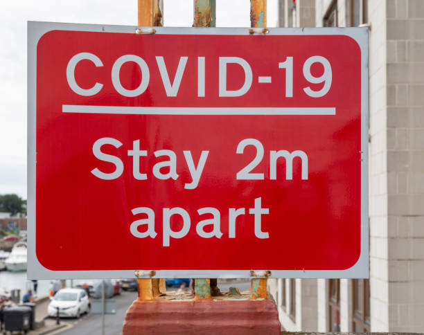 istock Covid-19 sign two meters apart 1341419321