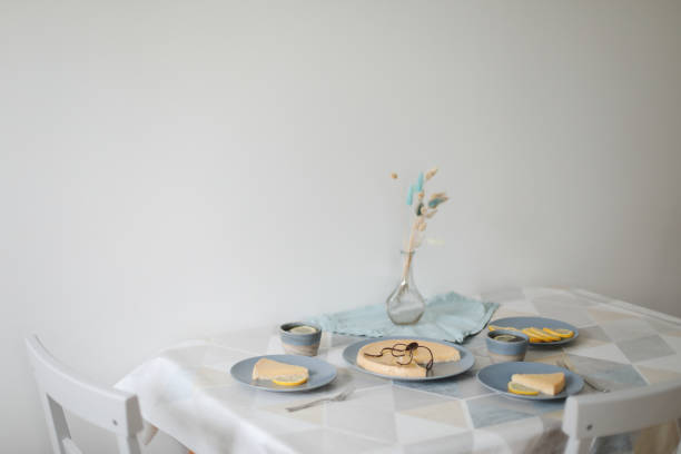 istock Breakfast with a lemon pie on plate with tea set and lemons 1341420295