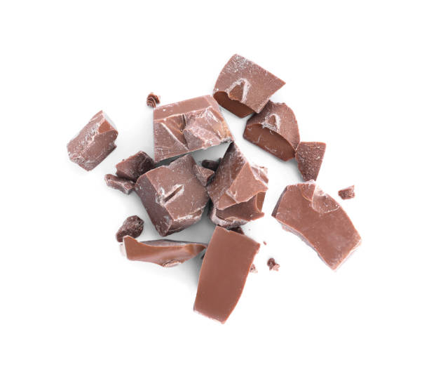 istock Pieces of milk chocolate isolated on white, top view 1341420397