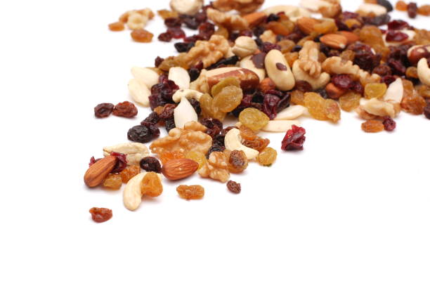 istock Mix of nuts isolated on a white background 1341427152