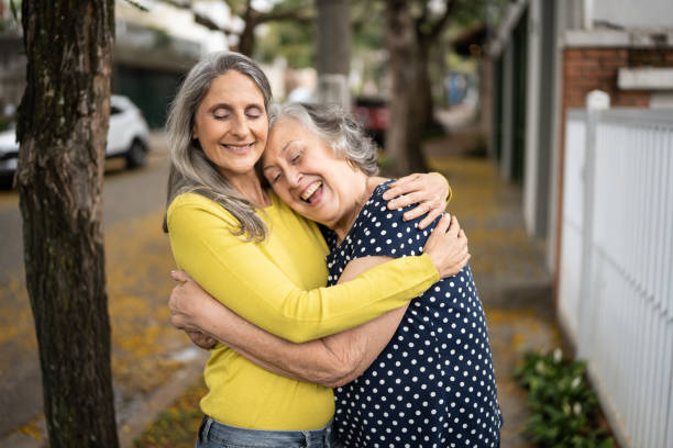 istock Mother and daughter embracing outdoors 1341427708