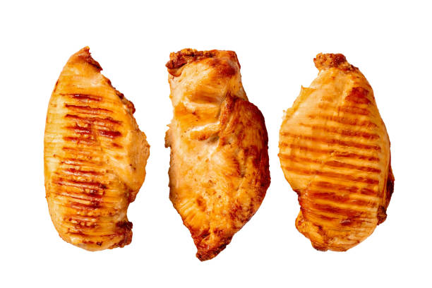 istock three whole grilled chicken breasts isolated on white background 1341430862