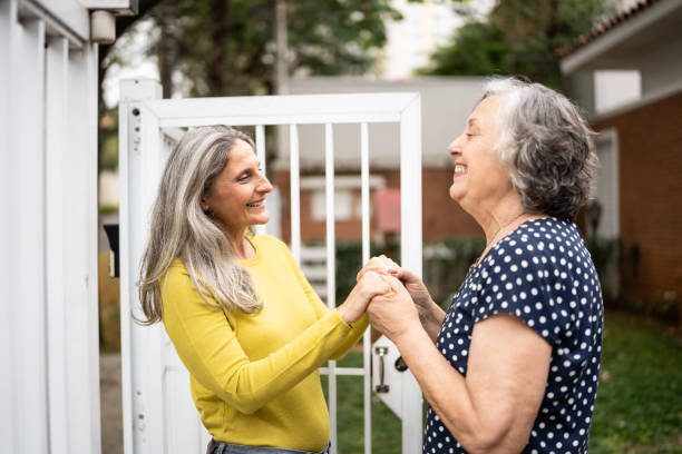 istock Mother welcoming daughter at home 1341431113
