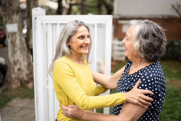 istock Mother welcoming daughter at home 1341431117