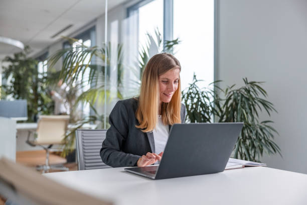 istock Female Manager Using Her Laptop in The Office 1341437486