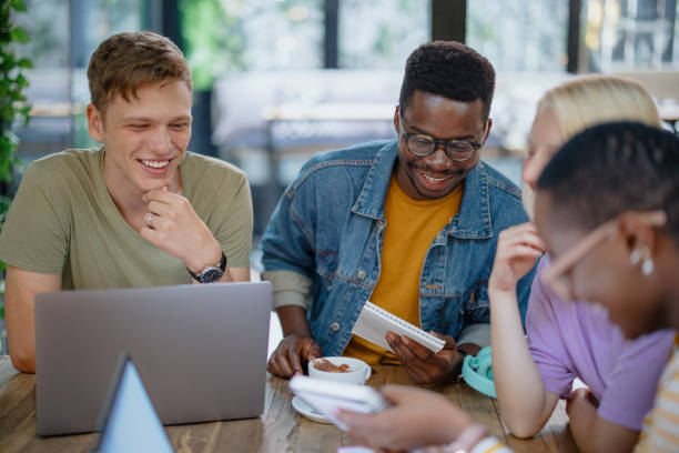 istock Multiethnic group of friends studying together 1341438052