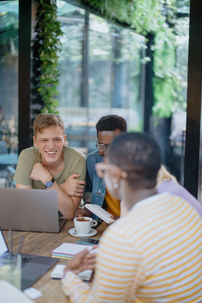 istock Multiethnic group of friends studying together 1341438073