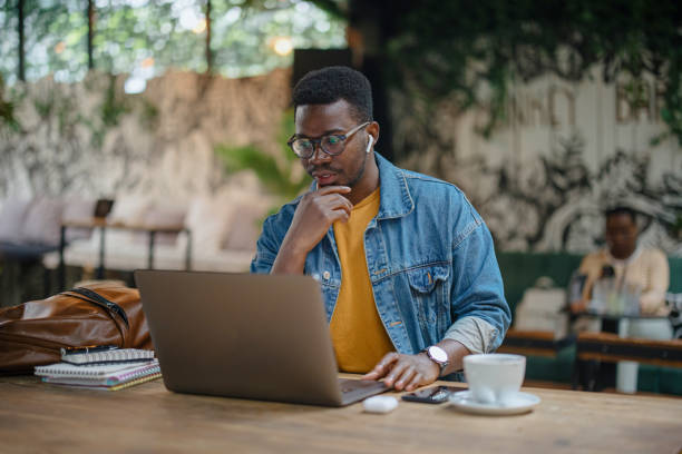 istock Young man teaches online. Online tutoring via video call 1341439030