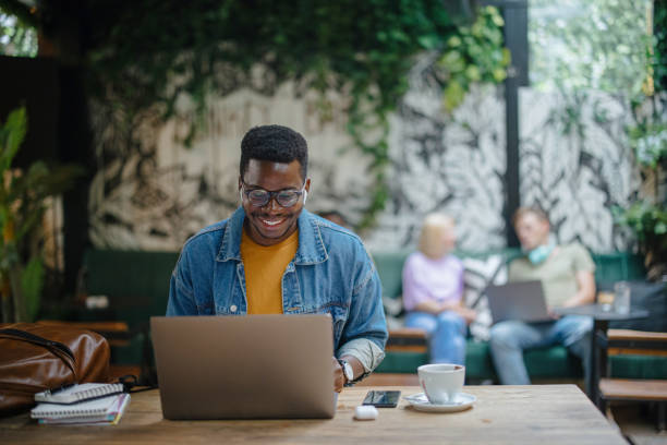 istock Young man teaches online. Online tutoring via video call 1341439265