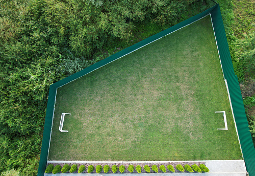 Backyard with football field aerial drone top view