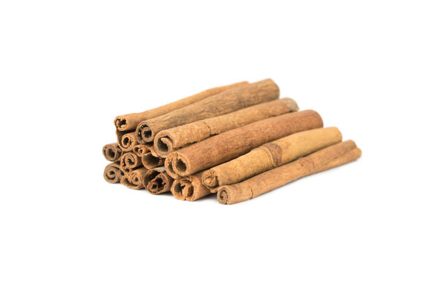 istock fresh natural cinnamon sticks isolated on the white backround 1341442821