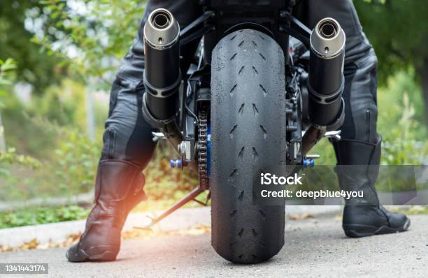 Motorcyclist Wants To Drive With The Side Stand Extended Stock Photo - Download Image Now